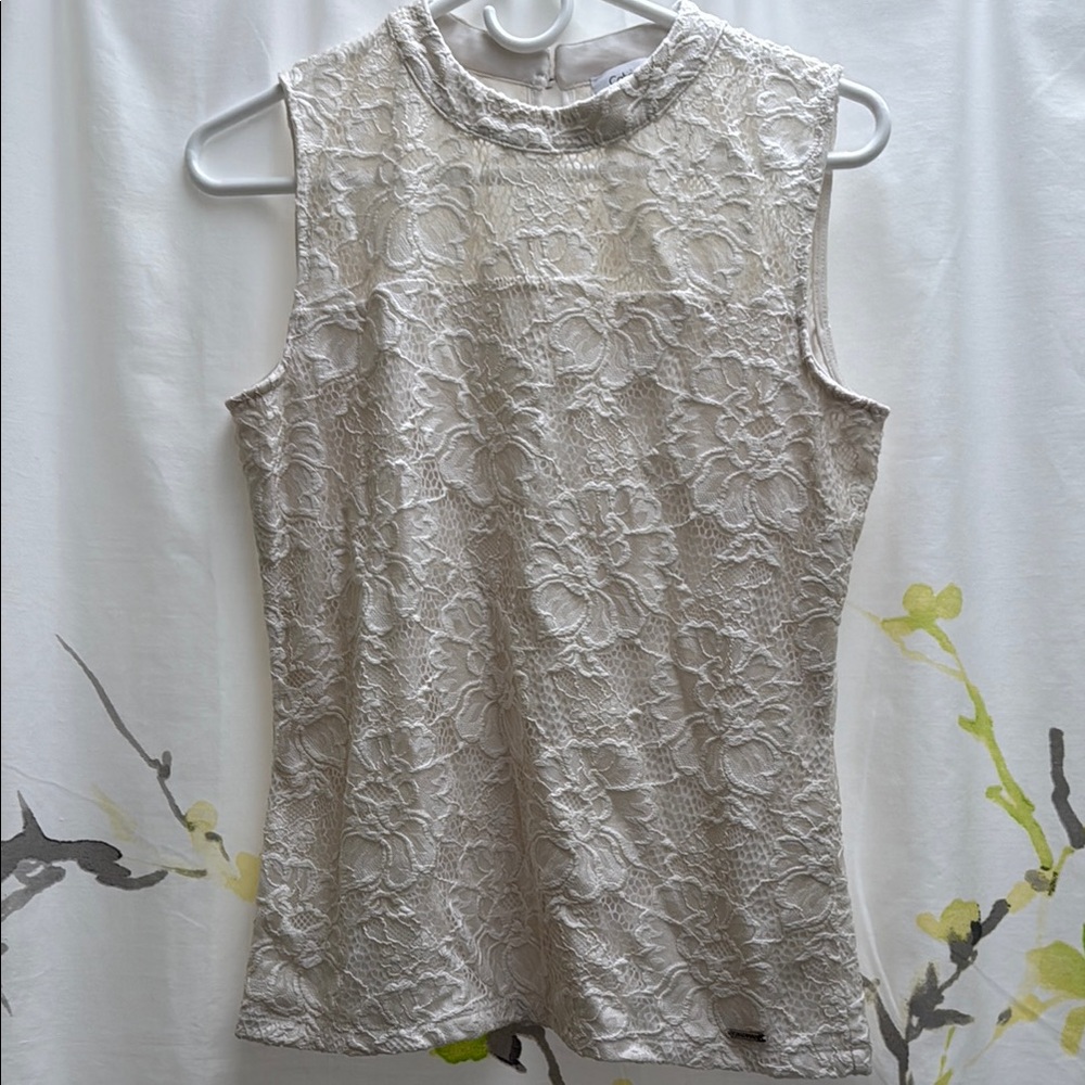 Calvin Klein Cream Blouse with Elegant Design - size M